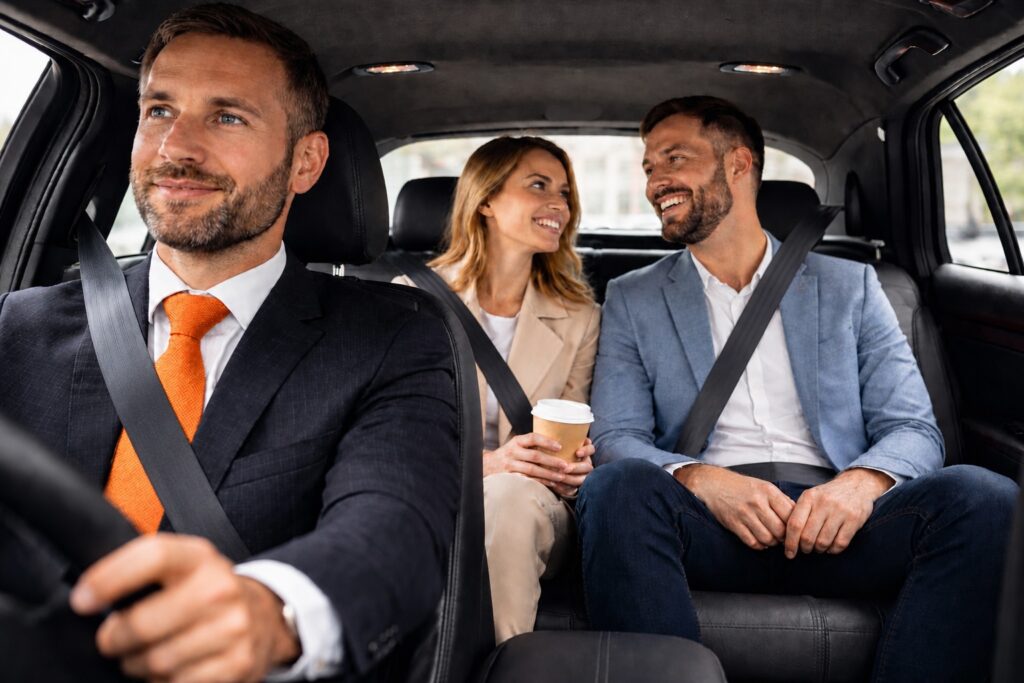 Passengers travelling in a premium Liverpool Street to Gatwick taxi with a professional driver